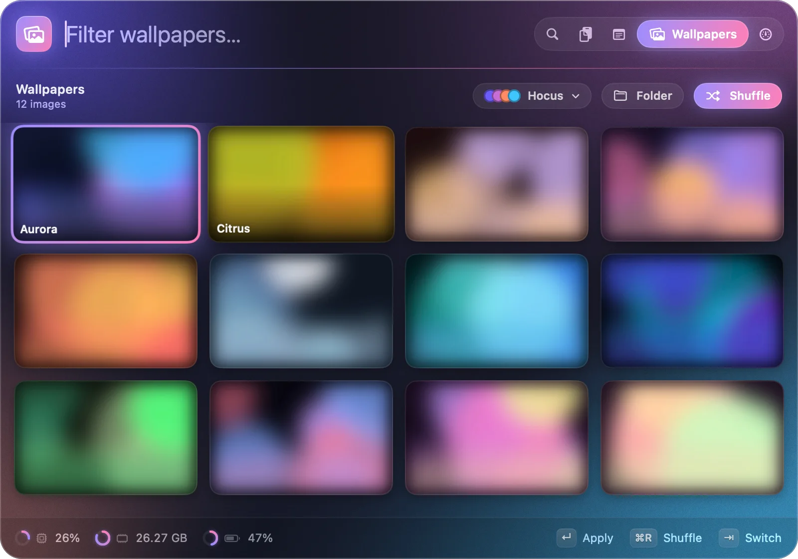 The wallpaper grid with twelve abstract wallpapers, a theme picker and a shuffle button